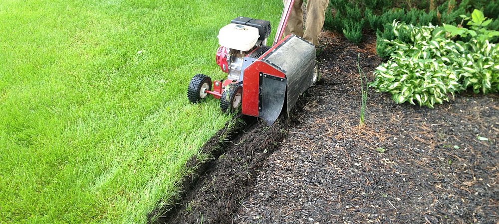 Edging & Mulching::Some people think that edging a lawn is an unnecessary obsession not worth the effort... Read More Seth Maurer Landscaping Edging cropped